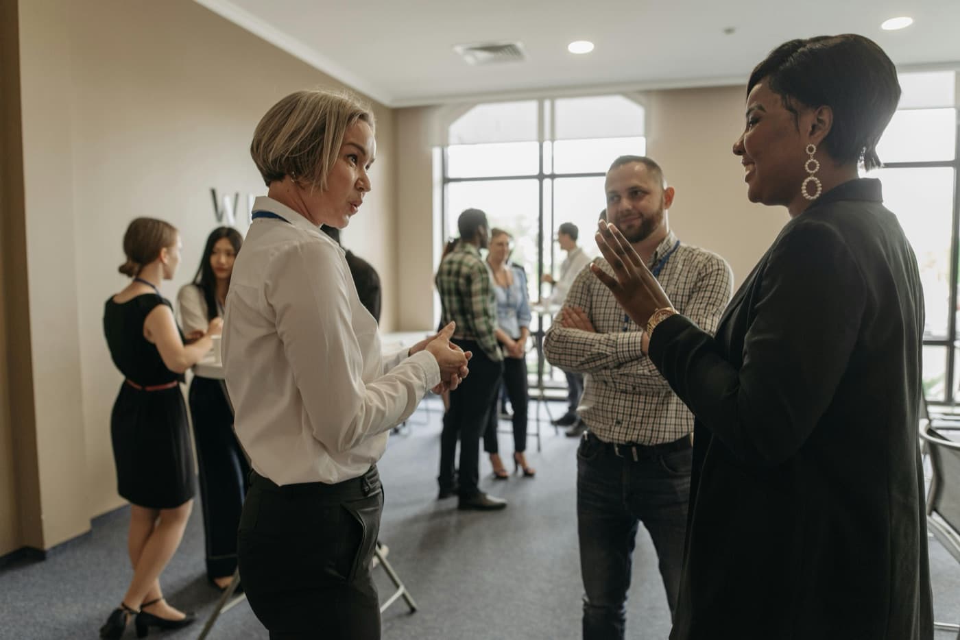 Partners shaking hands across a meeting table